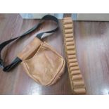 A leather cartridge belt and leather cartridge waist bag
