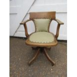 vintage oak swivel chair