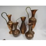 5 copper jugs