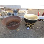 Ceramic plant pot and metal handled bowl