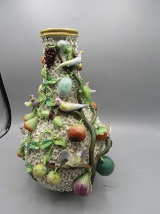 A Dresden (Crossed Swords) encrusted bottle shaped vase with lid, heavily decorated in flowers, - Image 3 of 9