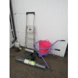 Wheelbarrow, alloy step ladder and roll of wire fencing etc