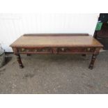 A carved hardwood coffee table/low table