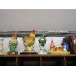 A china Parrott figure, 2 chicken figures and chicken dome