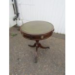 Mahogany leather topped tripod drum table with 3 drawers and 3 faux drawer fronts