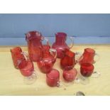 Cranberry glass jugs and cups