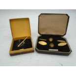 A gold tie pin (1.4 grams) marked acc 9c and rolled gold dress shirt set boxed