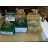 3 x boxed 'Best of breed' Donkey figurines and 4 x boxed Cow and Bull figurines