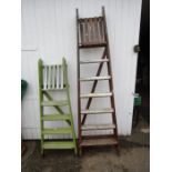 2 wooden ladders for display purposes