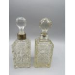 2 small silver collared decanters 18cmH