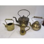 4 brass kettles
