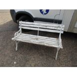 Garden bench with wrought iron ends