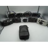 10x 35mm Compact Cameras