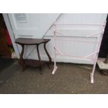 A mahogany hall table and pink vintage clothes airer