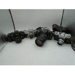 4x SLR Cameras