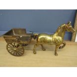 A brass horse with carriage