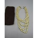 multi string pearl necklace