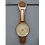 A cased wall aneroid barometer