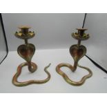 Pair of brass Cobra candlesticks