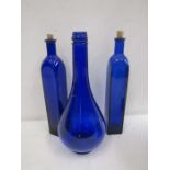 3 cobalt blue bottles