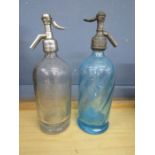 2 vintage soda bottles