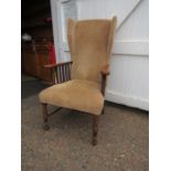 Wing back chair wirh wooden turned arms and legs