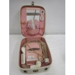 A vintage pink boxed elec hairdrier. for display purposes
