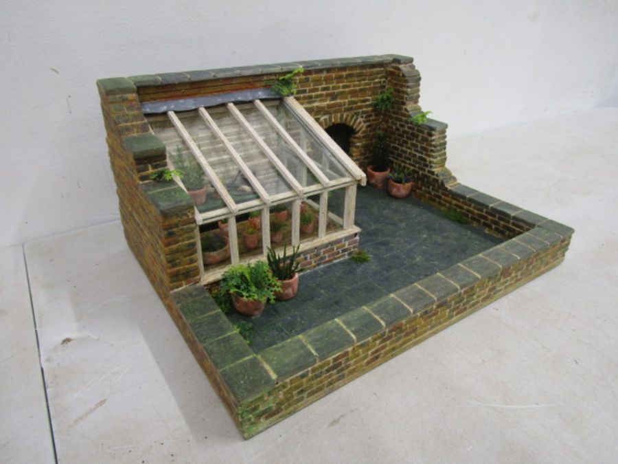 A scratch built walled garden with greenhouse made for Hampton Court Palace RHS flowershow in 1996. - Image 4 of 9