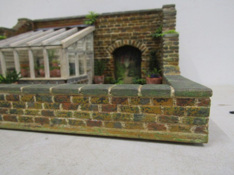 A scratch built walled garden with greenhouse made for Hampton Court Palace RHS flowershow in 1996. - Image 8 of 9