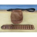 A leather cartridge belt and leather cartridge waist bag