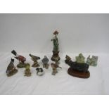 Bird figurines, a pig and a woman figurine