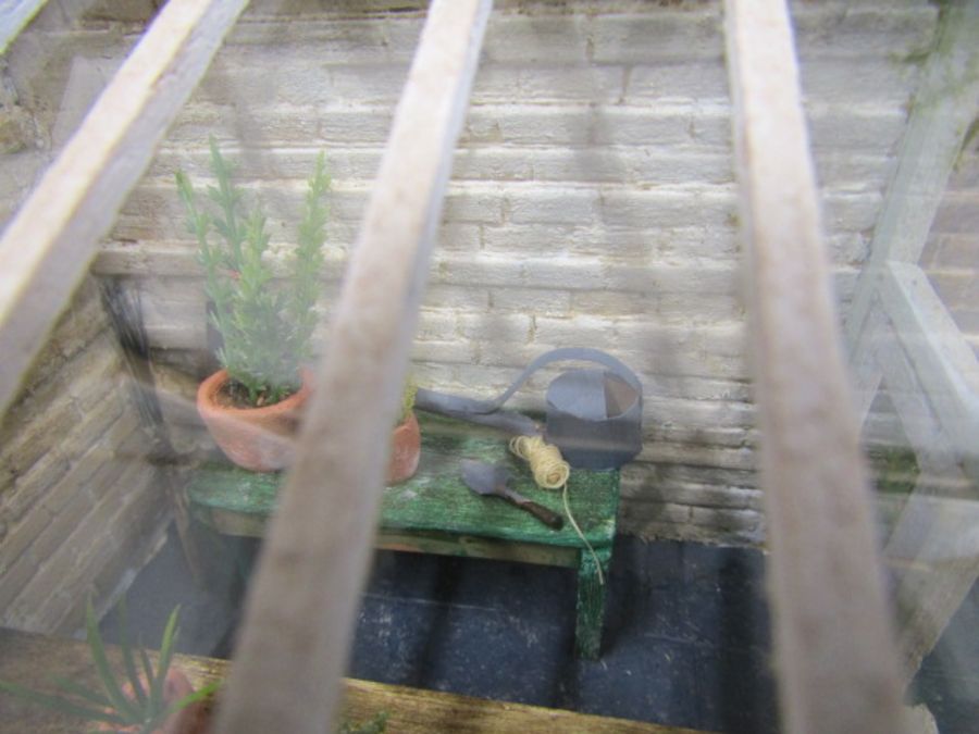 A scratch built walled garden with greenhouse made for Hampton Court Palace RHS flowershow in 1996. - Image 7 of 9