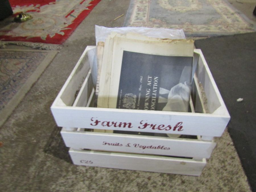 Newspapers from the 1930's to 1960's in wooden fruit crate
