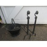 Pair of wrought iron fire dogs and coal bucket