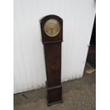 Oak cased granddaughter clock