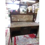 A mahogany dressing table with marble top and back with mirror