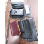 A Canon powershot camera, sure shot max and Nokia phone plus 4 leather wallets/purses