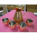 Copper jug and 4 copper plated mugs