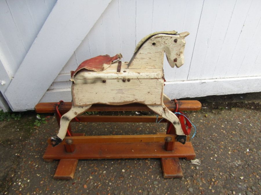 A vintage wooden rocking horse