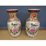 Pair of oriental peacock vases H48cm approx