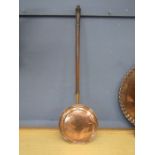 A copper bed pan