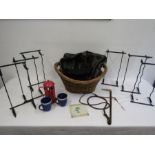 A basket of sundries inc riding whip, wine racks