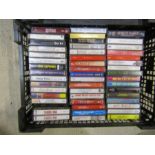 Box of cassette tapes including Def Leppard and a box of CD's