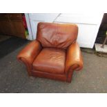 Brown leather armchair by John Lewis