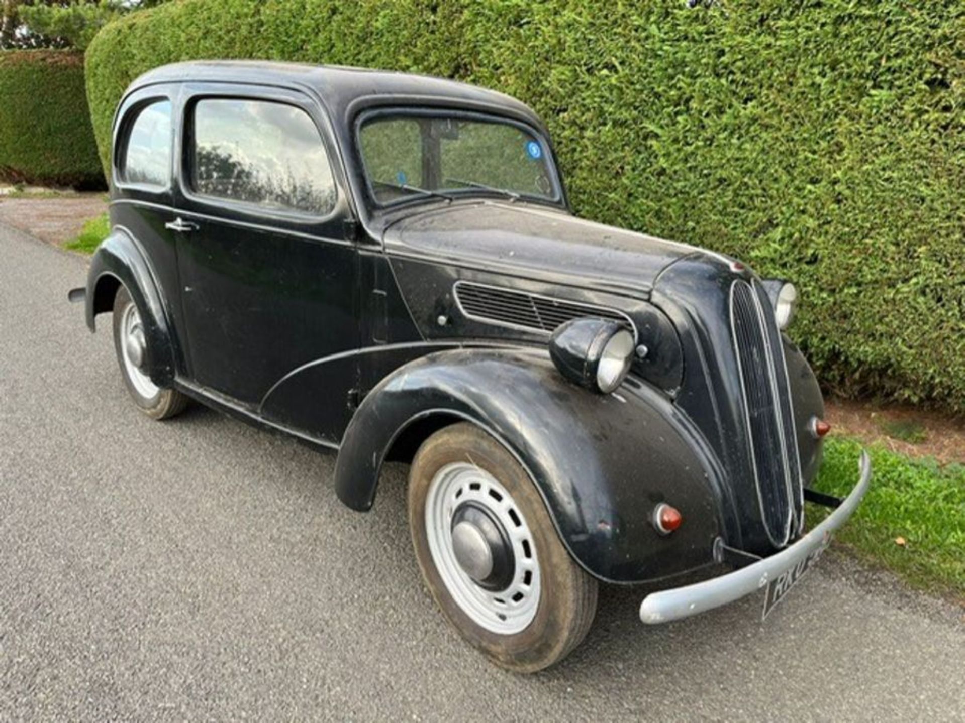 1953 Ford Anglia. A very late registered example, this charming little Anglia appears largely