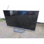 Panasonic 32" LCD TV with remote from a house clearance