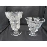 A Waterford crystal footed vase 22cm and a fluted footed heavy vase with etched flower detail 16cm