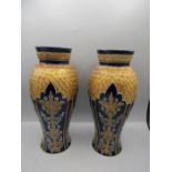 A pair Royal Doulton Lambeth baluster vases cobalt with gilt detail 28cm tall
