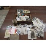 A small case containing vintage photographs