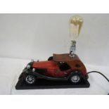A vintage toy car lamp, hand made by a local gent